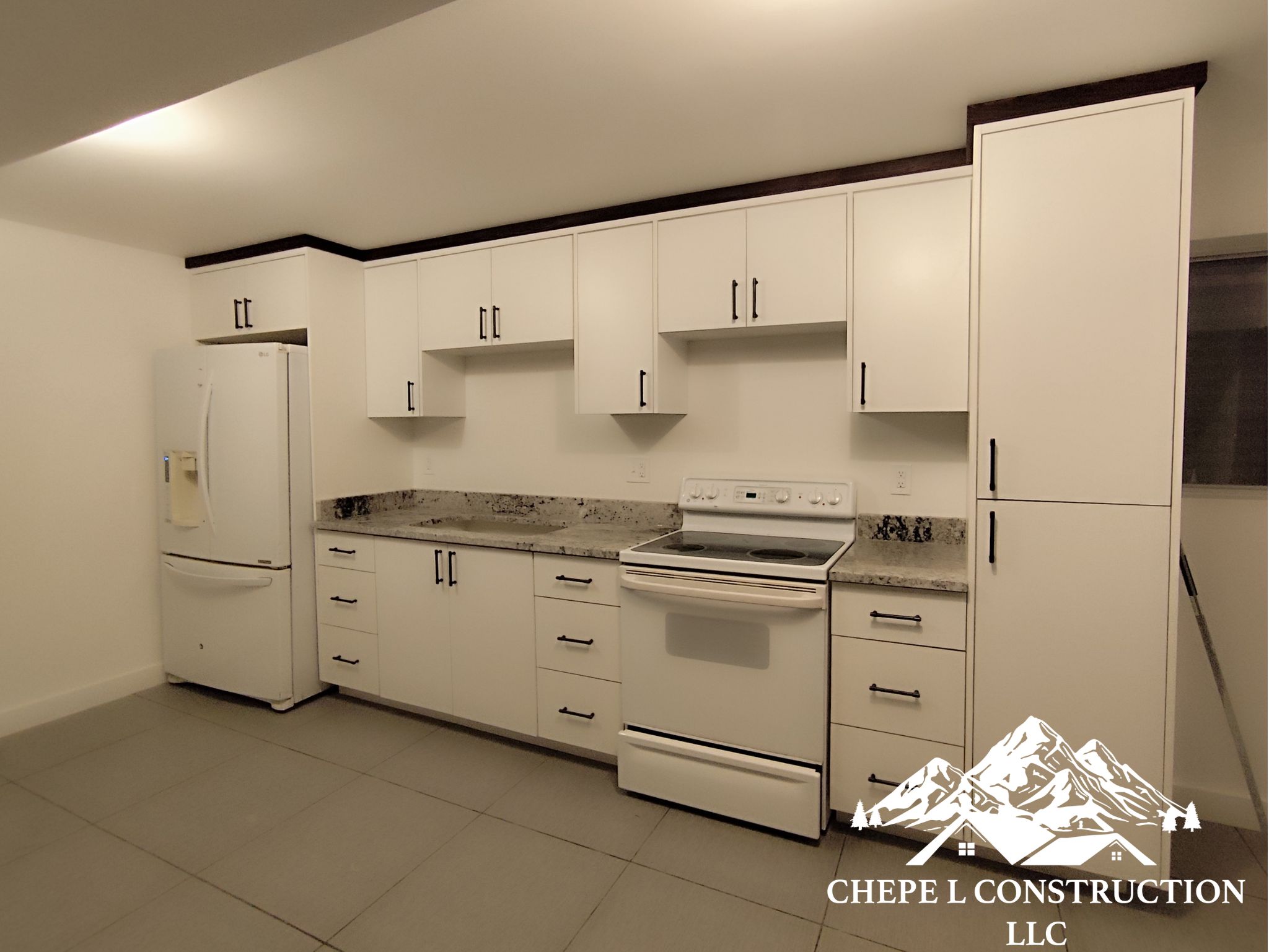 A beautifully finished modern kitchen after our home remodeling services.