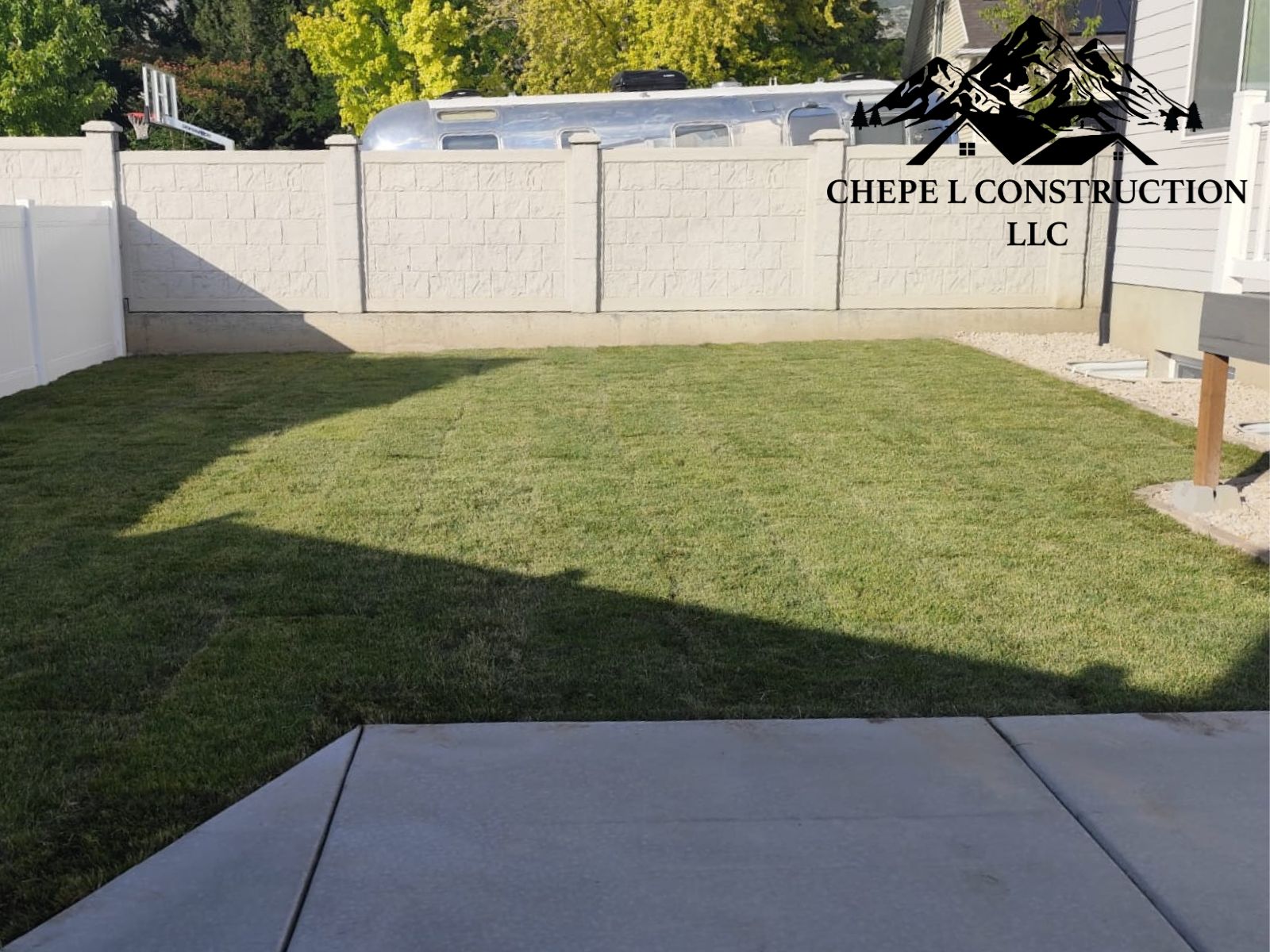 Lawn maintenance with fresh sod installation by our landscaping services team.
